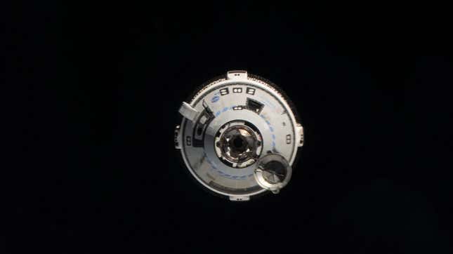 The Starliner spacecraft approaching the International Space Station. 