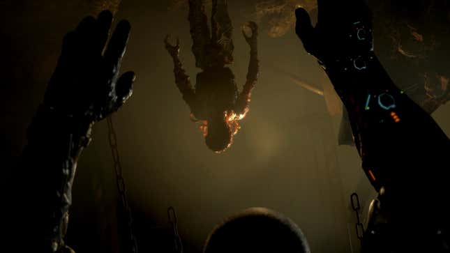 A man hangs upside down over a zombie in The Callisto Protocol.