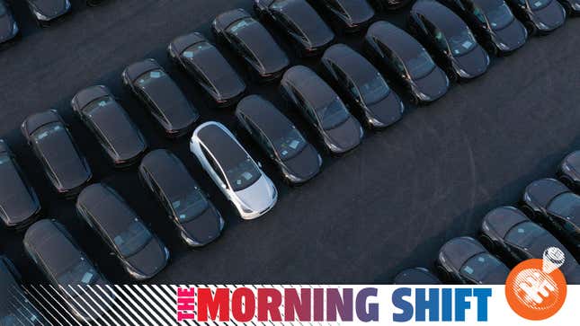 Rows of Tesla Model 3s sit in a company lot in Germany.