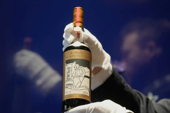 A bottle of the world&#39;s most valuable whisky is on display during a media preview of Sotheby&#39;s auction, in London, Thursday, Oct. 19, 2023. After being aged in sherry casks for six decades, just 40 bottles of The Macallan 1926 were bottled in 1986. This bottle of whisky has an estimated price of $900,000-1,450,000. Advance bidding will open on Nov.1, 2023. (AP Photo/Kin Cheung)