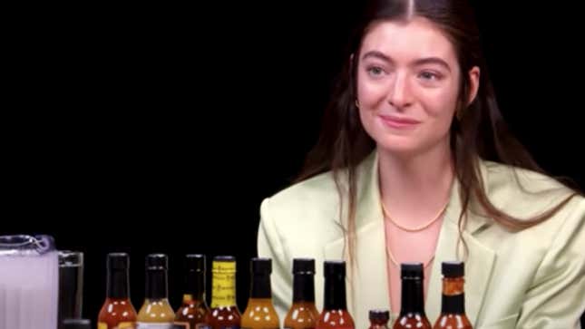 Image for article titled Lorde Eating the Spiciest Wing in Existence: 'That's a Nice Little Wing'