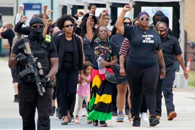 A group arrives to pay their respects at a memorial service for Jayland Walker, Wednesday, July 13, 2022, at the Akron Civic Center in Akron, Ohio. Walker, a Black motorist, was killed by Akron police in a hail of gunfire after a car and foot chase that began with an attempted traffic stop. The shooting is under investigation.