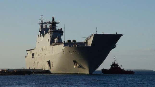 Australian Navy's HMAS Adelaide docked at Vuna Wharf in Tonga's capital Nukualofa on January 26, 2022