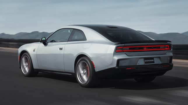 Rear 3/4 view of a silver 2024 Dodge Charger Daytona Scat Pack
