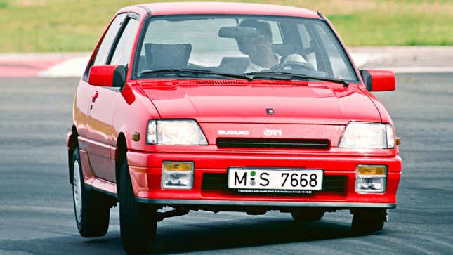 A photo of a red Suzuki Swift GTI Hatchback. 