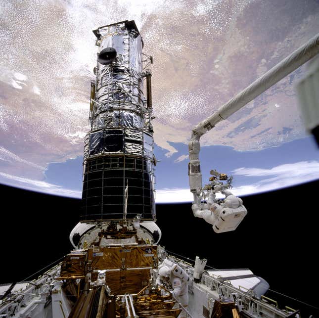 During  the first mission to service the Hubble Space Telescope in 1993,  astronauts installed a set of specialized lenses to correct a problem  that caused blurry images. 
