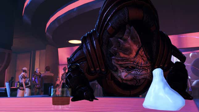 Wrex stands at a bar with a pack of ice in front of him.