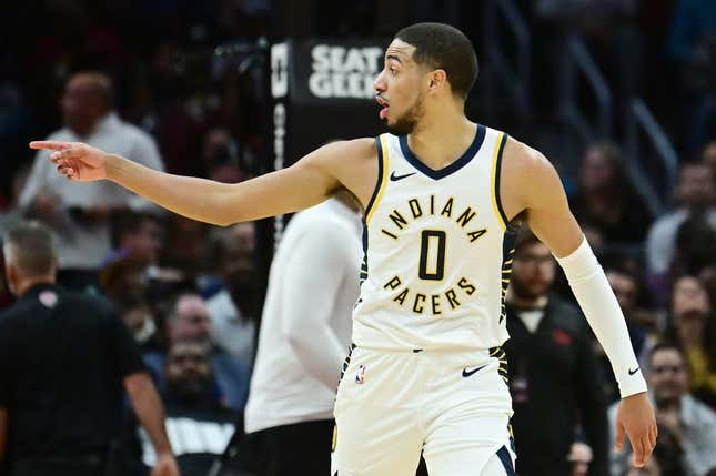 Oct 28, 2023; Cleveland, Ohio, USA; Indiana Pacers guard Tyrese Haliburton (0) taunts the crowd after shooting a three point basket during the second half against the Cleveland Cavaliers at Rocket Mortgage FieldHouse.