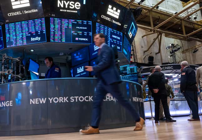 Traders work on the floor of the New York Stock Exchange on Jan. 10.