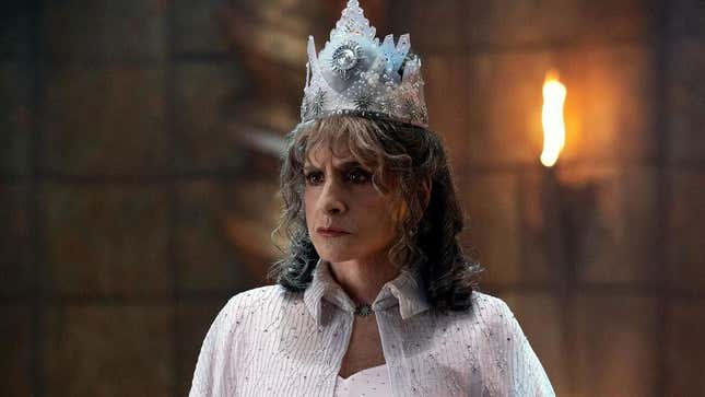 Patti LuPone dressed in a white cape and silver crown