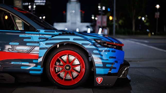 A photo of the red wheels on the CR-V race car. 