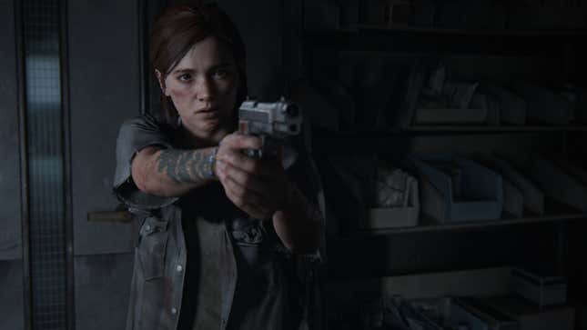 Ellie points a gun at someone in a dimly lit room.