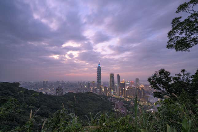 An elevated view of Taipei city during twilight.