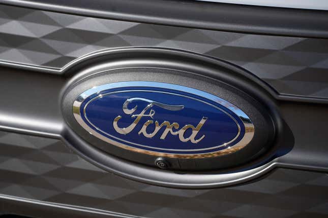 FILE - The Ford company logo is shown on Thursday, Nov. 25, 2022, outside a Ford dealership in southeast Denver. Ford is recalling more than 238,000 Explorers in the U.S. because a rear axle bolt can fail, potentially causing a loss of drive power or allowing the SUVs to roll away while in park. The recall on Friday, Oct. 13, 2023, comes after U.S. safety regulators opened an investigation into the problem after getting two complaints that repairs didn’t work in two previous recalls this year and in 2022. (AP Photo/David Zalubowski, File)