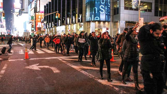 Protesters walk uptown from Times Square in Midtown Manhattan.