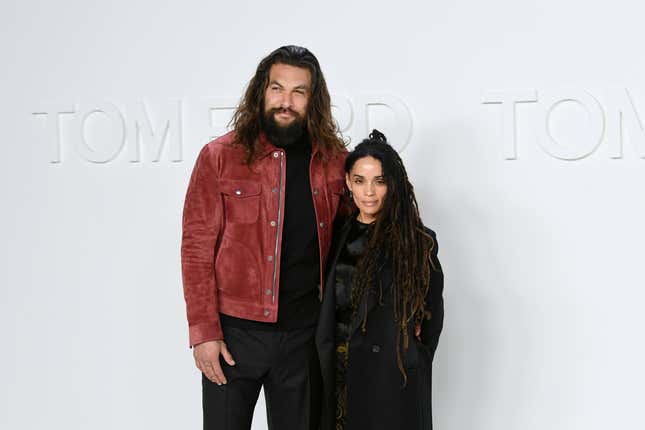 Jason Momoa (L) and ﻿Lisa Bonet attend the Tom Ford AW20 Show at Milk Studios on February 07, 2020 in Hollywood, California.