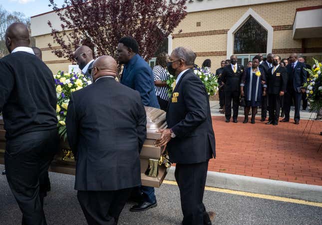 MARCH 29: Family members watch as the casket is loaded into the hearse after the funeral for Irvo Otieno, killed by sherrifs deputies and employees of Central State Hospital earlier this month, in Richmond, VA. (Photo by Bill O’Leary/The Washington Post via Getty Images)