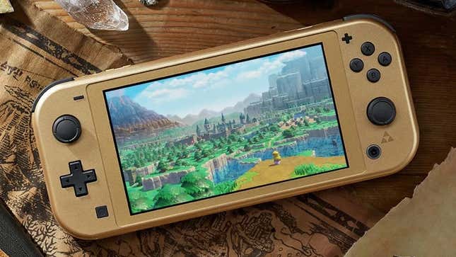 A Zelda edition Switch lite sits on a table with a map. 