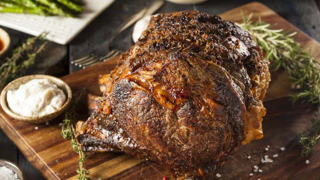 Prime rib roast on a cutting board.