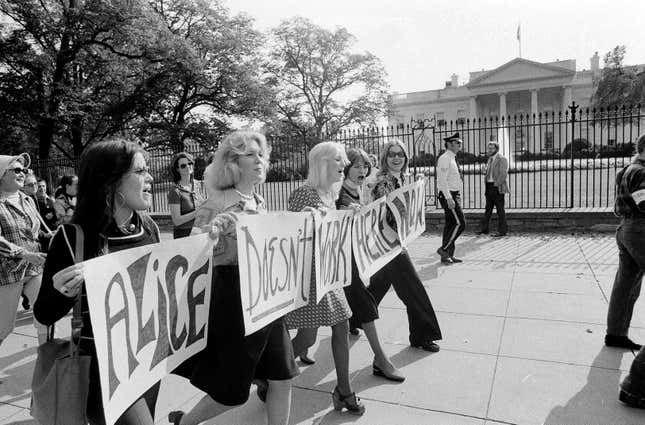 Women marchers pass the White House in Washington, D.C., Oct. 29, 1975, as part of a demonstration in response to the National Organization for Women’s call for a nationwide strike. “Alice Doesn’t” refers to the movie “Alice Doesn’t Live Here Anymore,” which deals with women’s liberation. 