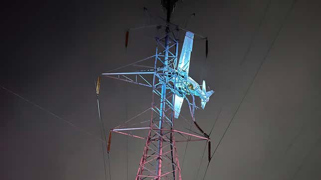 A small single-engine plane smashed into a electrical transmission tower