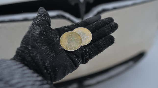 A person holding commemorative physical Bitcoin tokens in Edmonton, Alberta, Canada on Jan. 7, 2022.