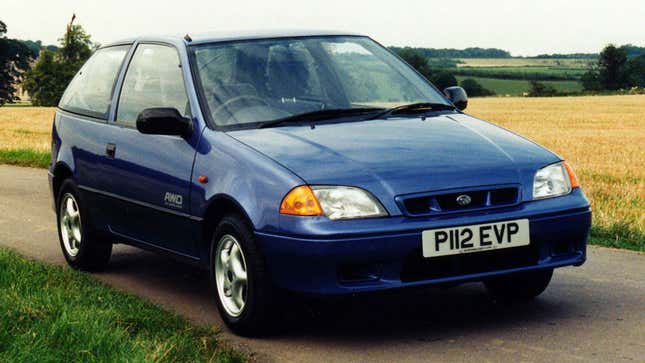 A blue Subaru Justy hatchback 