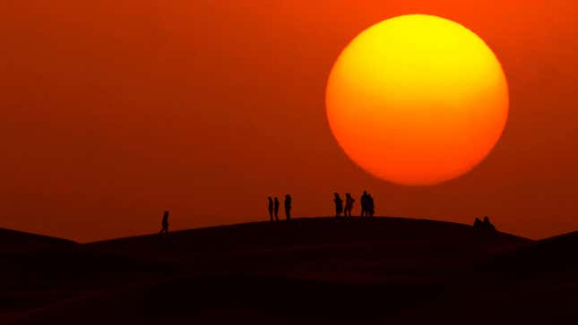 The sun sets on the Moroccan portion of the Sahara Desert.