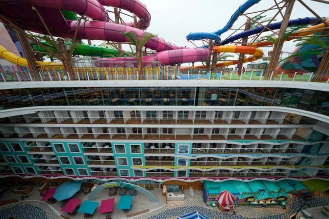 FILE - Waterslides are seen atop a deck overlooking floors of rooms aboard Icon of the Seas, the world&#39;s largest cruise ship, during a media day preview as it prepares for its inaugural public voyage later this month, Thursday, Jan. 11, 2024, in Miami. Royal Caribbean’s Icon of the Seas is leaving South Florida on Saturday, Jan. 27, for its first seven-day island-hopping voyage through the tropics. (AP Photo/Rebecca Blackwell, File)