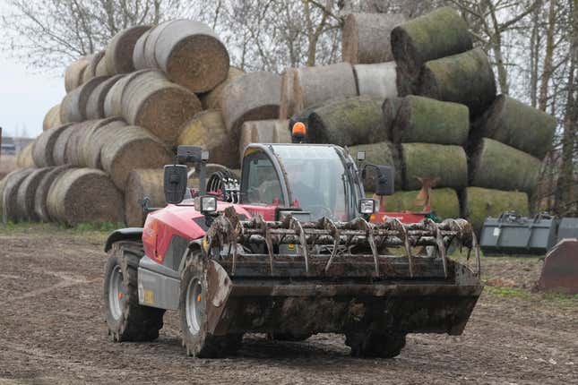 Piotr Korycki, a 34-year-old Polish farmer, drives farm equipment on his farm in Cywiny Wojskie, Poland, on Monday March 18, 2024. Piotr says his business has been badly destabilized by Russia’s war against Ukraine and that the European Union is only adding to his problems. He&#39;s among the large number of farmers who have protested across Europe for months, and he’s organizing the latest protest planned for Poland on Wednesday. (AP Photo/Czarek Sokolowski)