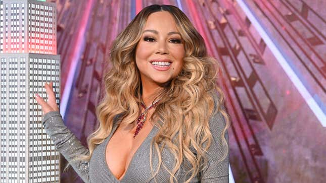 Mariah Carey lights the Empire State Building in celebration of the 25th anniversary of “All I Want For Christmas Is You” on December 17, 2019 in New York City.