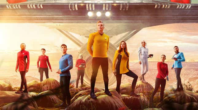 The main cast of Paramount Plus' Star Trek: Strange New Worlds, with the USS Enterprise in the background. 