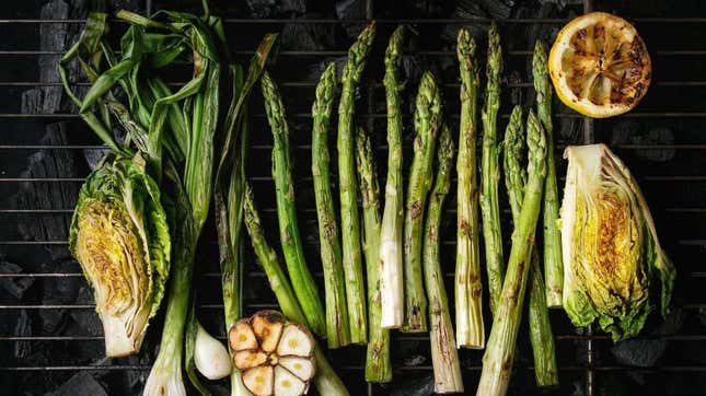 Row of roasted veggies (asparagus, sprouts, etc.)