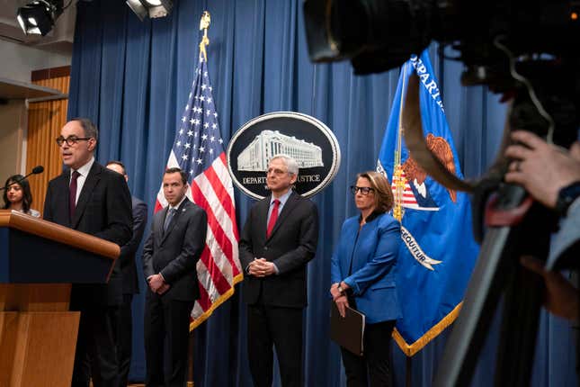 Assistant Attorney General Jonathan Kanter, of the Antitrust Division, from second left, speaks as New Jersey Attorney General Matthew Platkin, Attorney General Merrick Garland and Deputy Attorney General Lisa Monaco, listen during a news conference on antitrust complaint agains Apple at Department of Justice headquarters in Washington, Thursday, March 21, 2024. The Justice Department on Thursday announced a sweeping antitrust lawsuit against Apple, accusing the tech giant of engineering an illegal monopoly in smartphones that boxes out competitors and stifles innovation. (AP Photo/Jose Luis Magana)