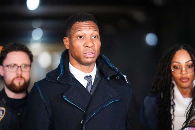 NEW YORK, NEW YORK - DECEMBER 15: Actor Jonathan Majors leaves the courthouse following closing arguments in Majors’ domestic violence trial at Manhattan Criminal Court on December 15, 2023 in New York City. Majors had plead not guilty but faces up to a year in jail if convicted on misdemeanor charges of assault and harassment of an ex-girlfriend. (
