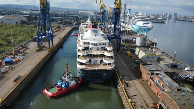 The Villa Vie Odyssey docking at the Harland and Wolf Shipyard in Belfast, Northern Ireland