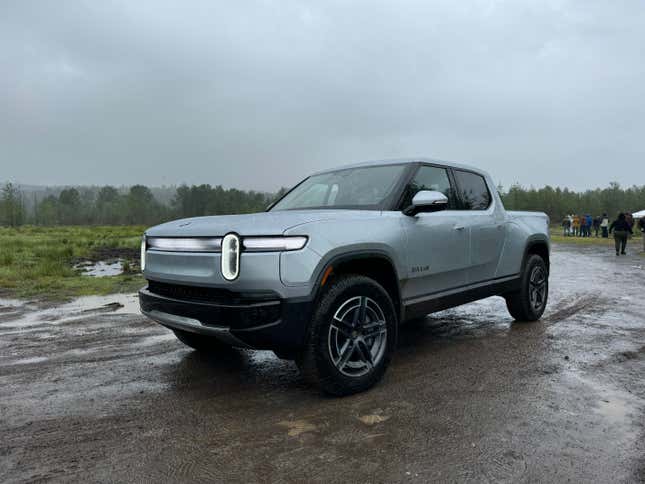 Front 3/4 view of a silver Rivian R1T