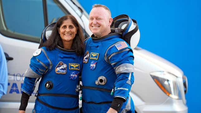 NASA astronauts Suni Williams, left, and Butch Wilmore wearing their Boeing space suits