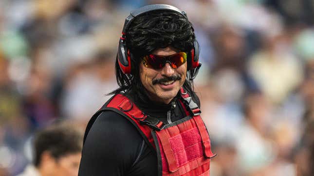 Dr Disrespect smiles in a crowd. 