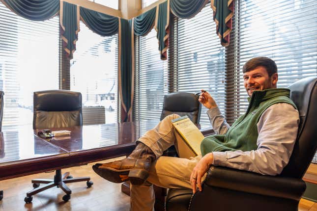 Hunter Garnett, of Garnett Patterson Injury Lawyers, poses at his law office near the Madison County courthouse, Thursday, Jan. 25, 2024, in Huntsville, Ala. Garnett is seeking a smaller office space in the suburbs closer to his clients, rather than the large space he has now. (AP Photo/Vasha Hunt)