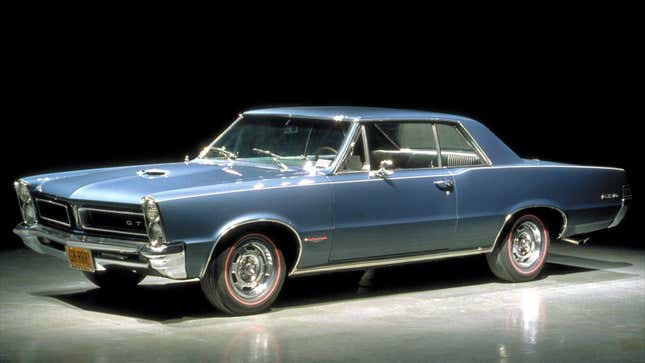 A photo of a blue Pontiac GTO muscle car. 