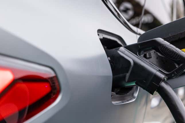  A general picture shows a cable charging an electric BMW i4 car during the inauguration of an Atlante electric vehicle charging station, located at CityLife district, on December 11, 2023 in Milan, Italy