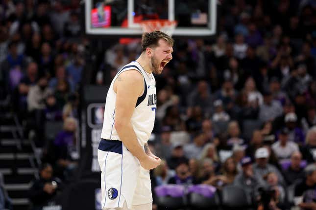 SACRAMENTO, CALIFORNIA - MARCH 26: Luka Doncic #77 of the Dallas Mavericks reacts after the Mavericks scored a basket Sacramento Kings in the second half at Golden 1 Center on March 26, 2024 in Sacramento, California. NOTE TO USER: User expressly acknowledges and agrees that, by downloading and or using this photograph, User is consenting to the terms and conditions of the Getty Images License Agreement. (Photo by Ezra Shaw/Getty Images)