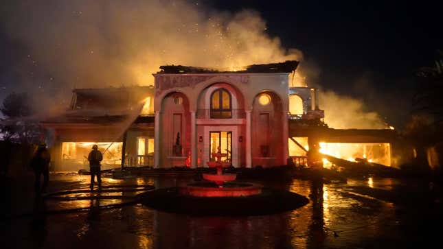 Firefighters worked to extinguish the flames in Laguna Niguel, California
