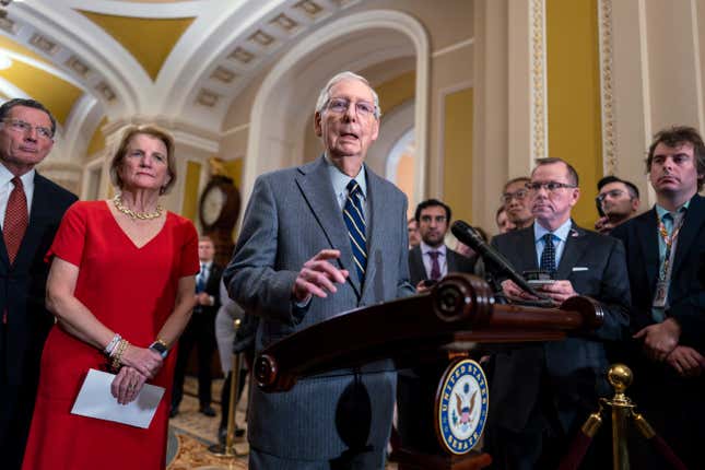 Senate Minority Leader Mitch McConnell, R-Ky., joined from left by Sen. John Barrasso, R-Wyo., and Sen. Shelley Moore Capito, R-W.Va., speaks to reporters at the Capitol in Washington, Wednesday, March 6, 2024. (AP Photo/J. Scott Applewhite)