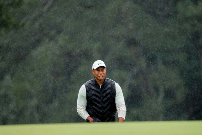 Tiger Woods lines up his putt on the 18th green during the second round of the Masters.

Pga Masters Tournament Completion Of Second Round