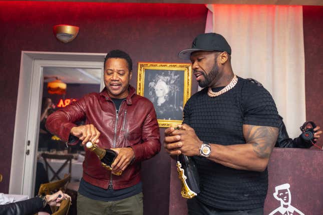 Cuba Gooding Jr. and 50 cent attend a birthday dinner for Cuba Gooding Jr. hosted by 50 Cent at Sopra Miami on December 31, 2023 in Miami Beach, Florida.