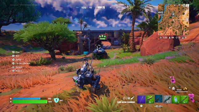 Hooked to the back of a car, being dragged along Fortnite's grass.