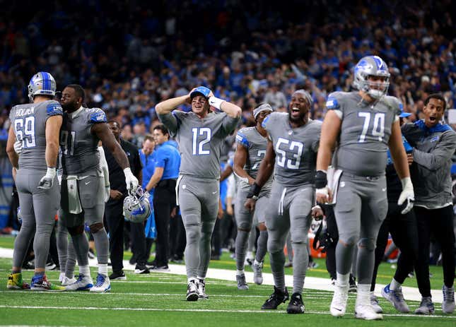 The Detroit Lions celebrate after defeating the Minnesota Vikings 29-27 at Ford Field on December 05, 2021 in Detroit, Michigan. (Photo by /Getty Images)