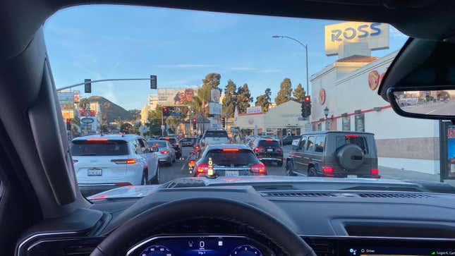 the view from the drivers seat of a HD pickup in the middle lane